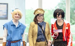 3 teen cosplayers