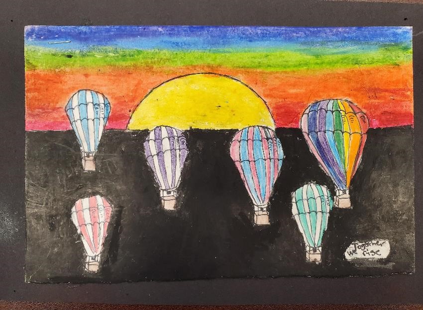 Hot air balloons in front of a sunrise with the words Together we Rise