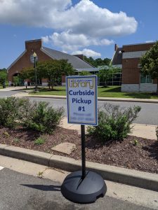 Driveup sign in a parking spot