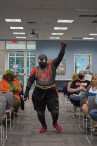 A cosplayer waring a Spiderman outfit