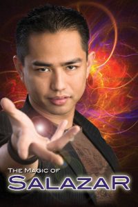 A Filipino man stands with arm extended, palm up, looking at the camera in front of a swirling background of purple, orange, red, and yellow. Text reads The Magic of Salazar