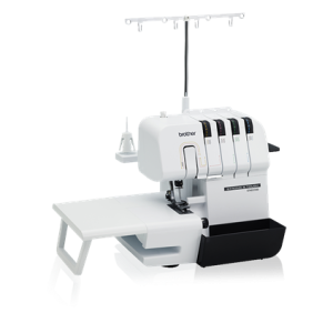 A white and black serger with a table set up on the side