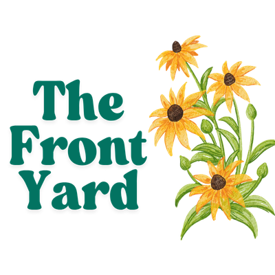 The Front Yard, with a group of yellow flowers