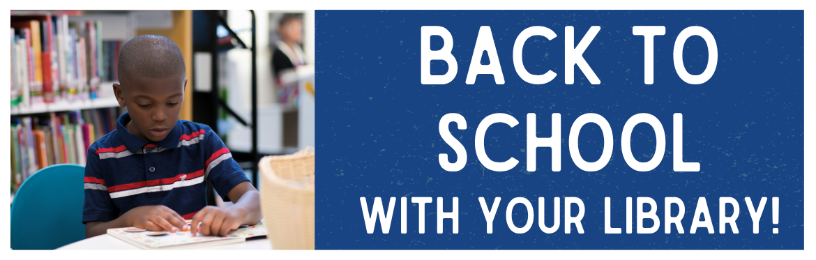 A young boy sits at a table in the library, reading a book. Back to School with Your Library!