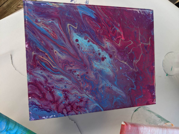 blue and purple abstract pour painting in acrylic