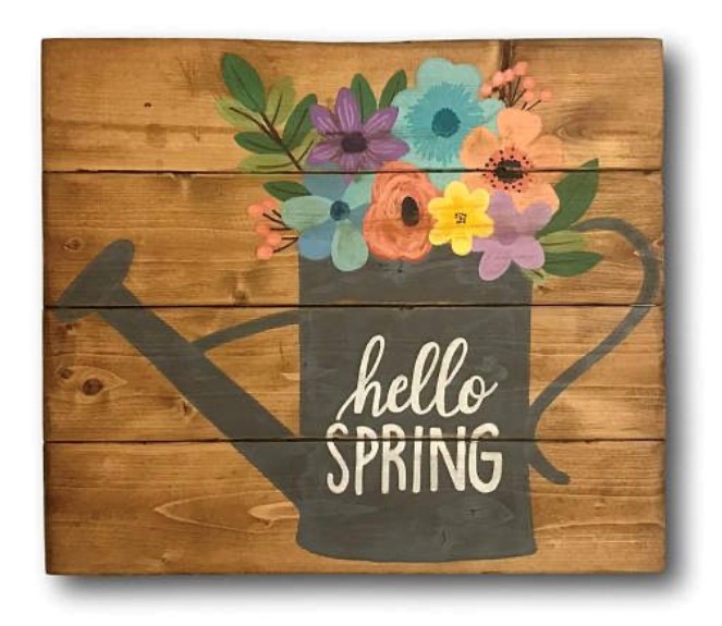 watering can with colorful flowers and the words hello spring